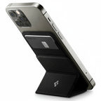  Spigen MagSafe Card Holder in black for carrying cards, designed for compatibility with iPhone.
