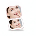  Portable LED Makeup Mirror with magnification, compact and travel-friendly design in pink.