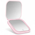  Portable LED Makeup Mirror with magnification, compact and travel-friendly design in pink.