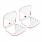  Portable LED Makeup Mirror with magnification, compact and travel-friendly design in pink.