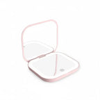  Portable LED Makeup Mirror with magnification, compact and travel-friendly design in pink.